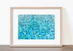Fine art print of blue and turquoise pool tiles with sunlit reflections and soft, painterly movement.