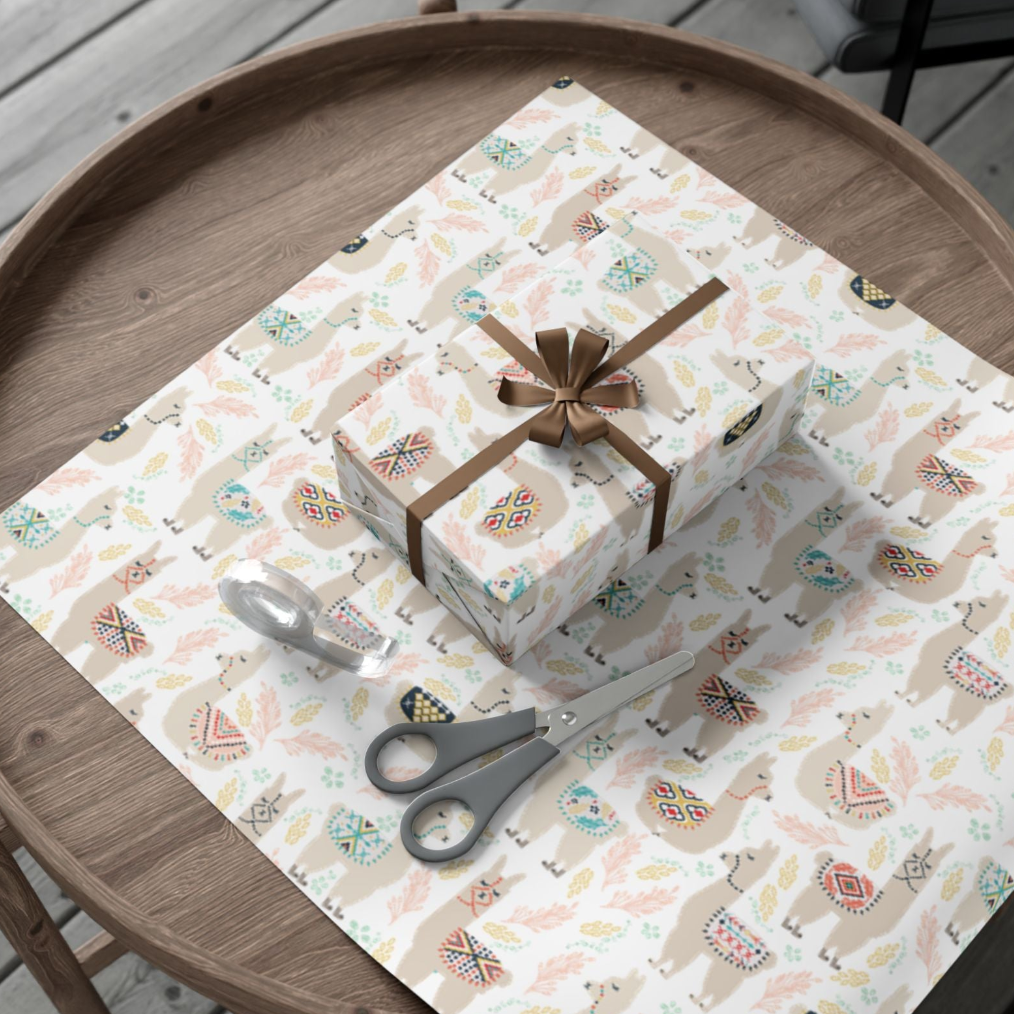 LaLaLlama gift wrap design created for a Minted Design Challenge shown in a styled flat‑lay with scissors and ribbon.