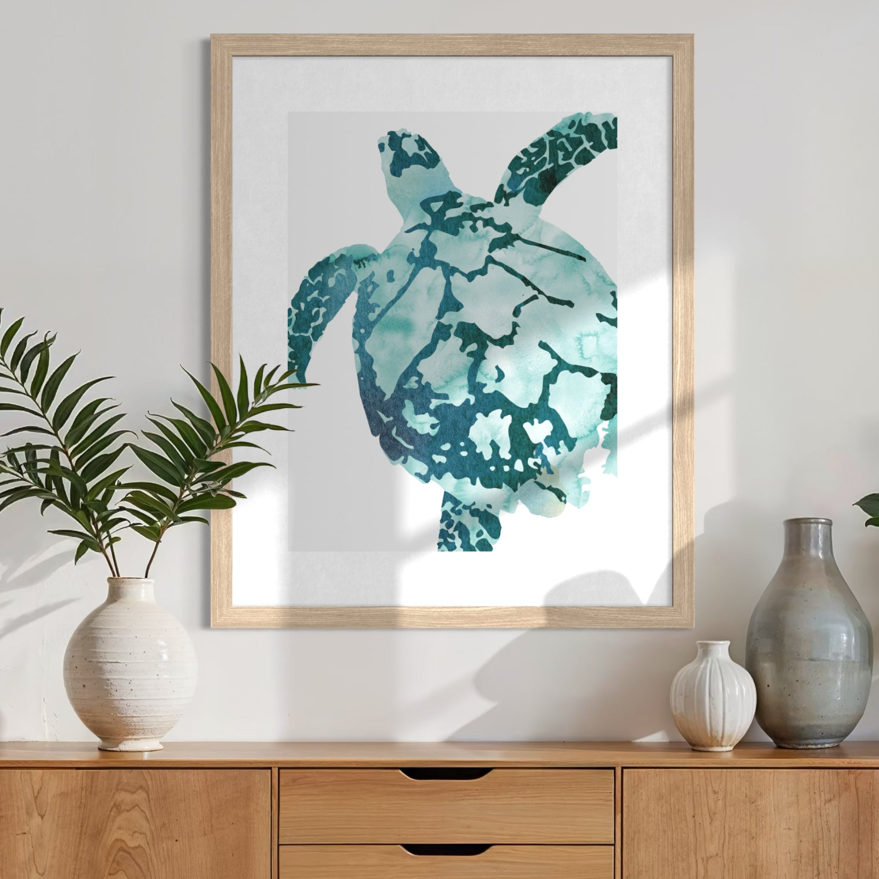 Framed Tropical Sea Turtle artwork styled in a coastal bedroom setting from the Minted x Pottery Barn Teen collection.