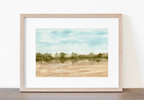 Watercolor landscape of golden hills with soft movement and a turquoise sky.